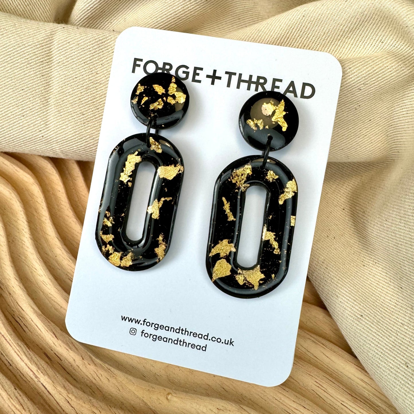 GOLD & BLACK OVAL DROP EARRINGS