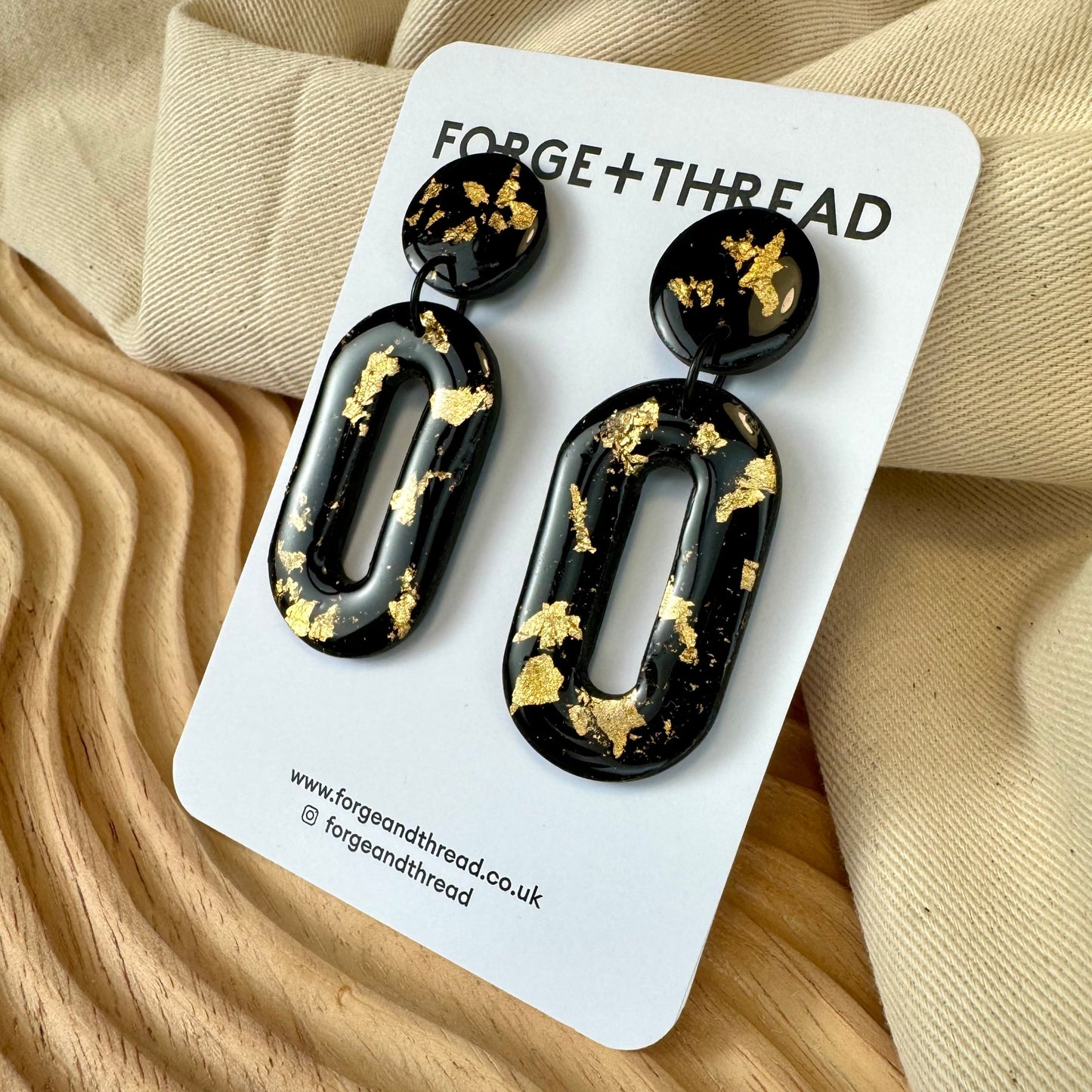 GOLD & BLACK OVAL DROP EARRINGS