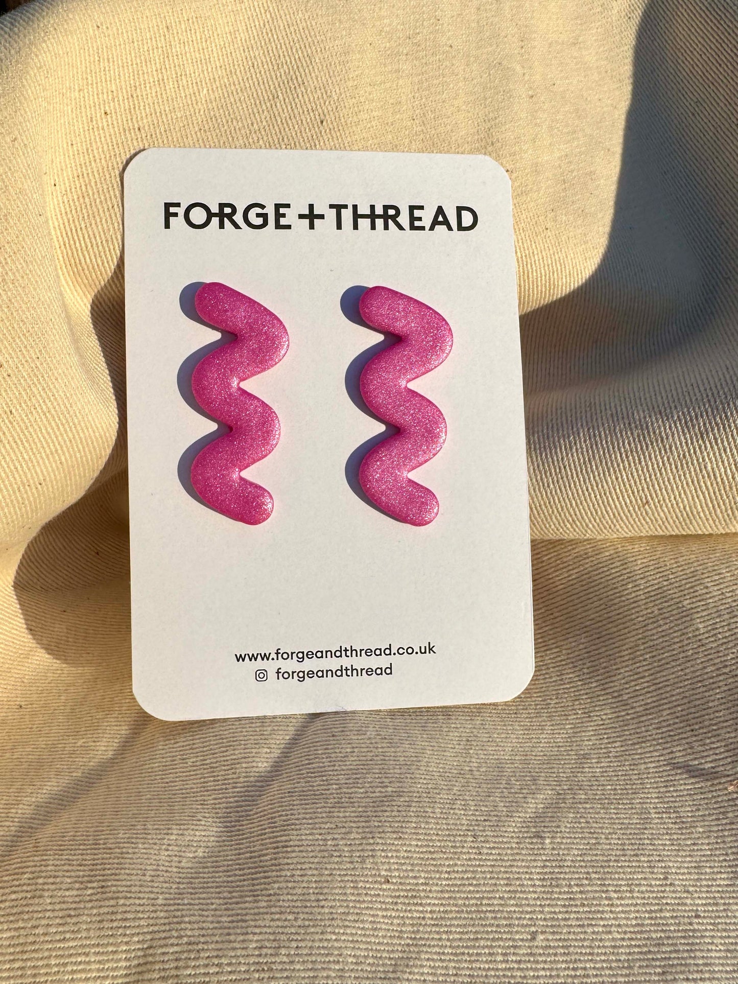 METALLIC PINK WIGGLE EARRINGS