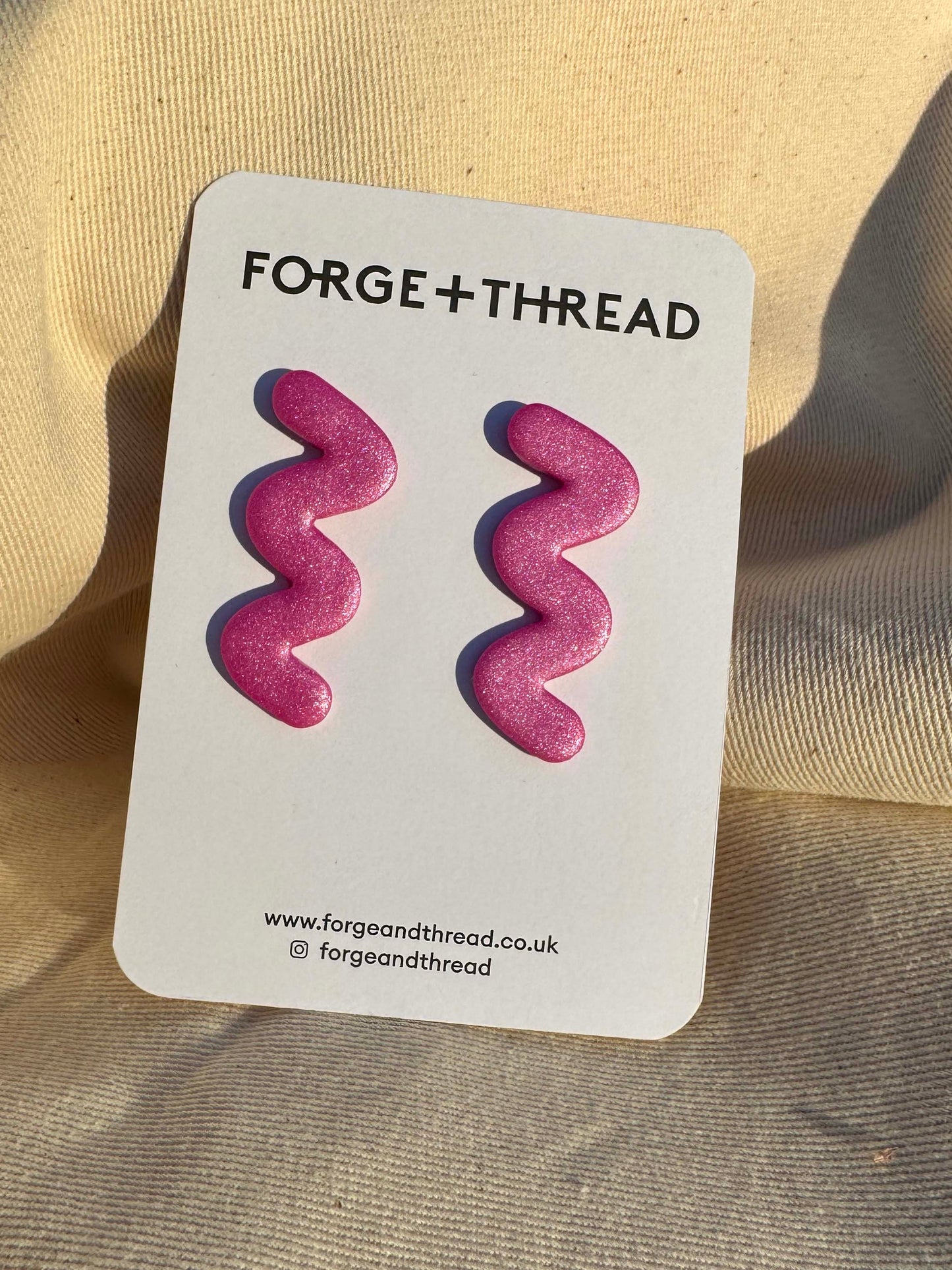 METALLIC PINK WIGGLE EARRINGS