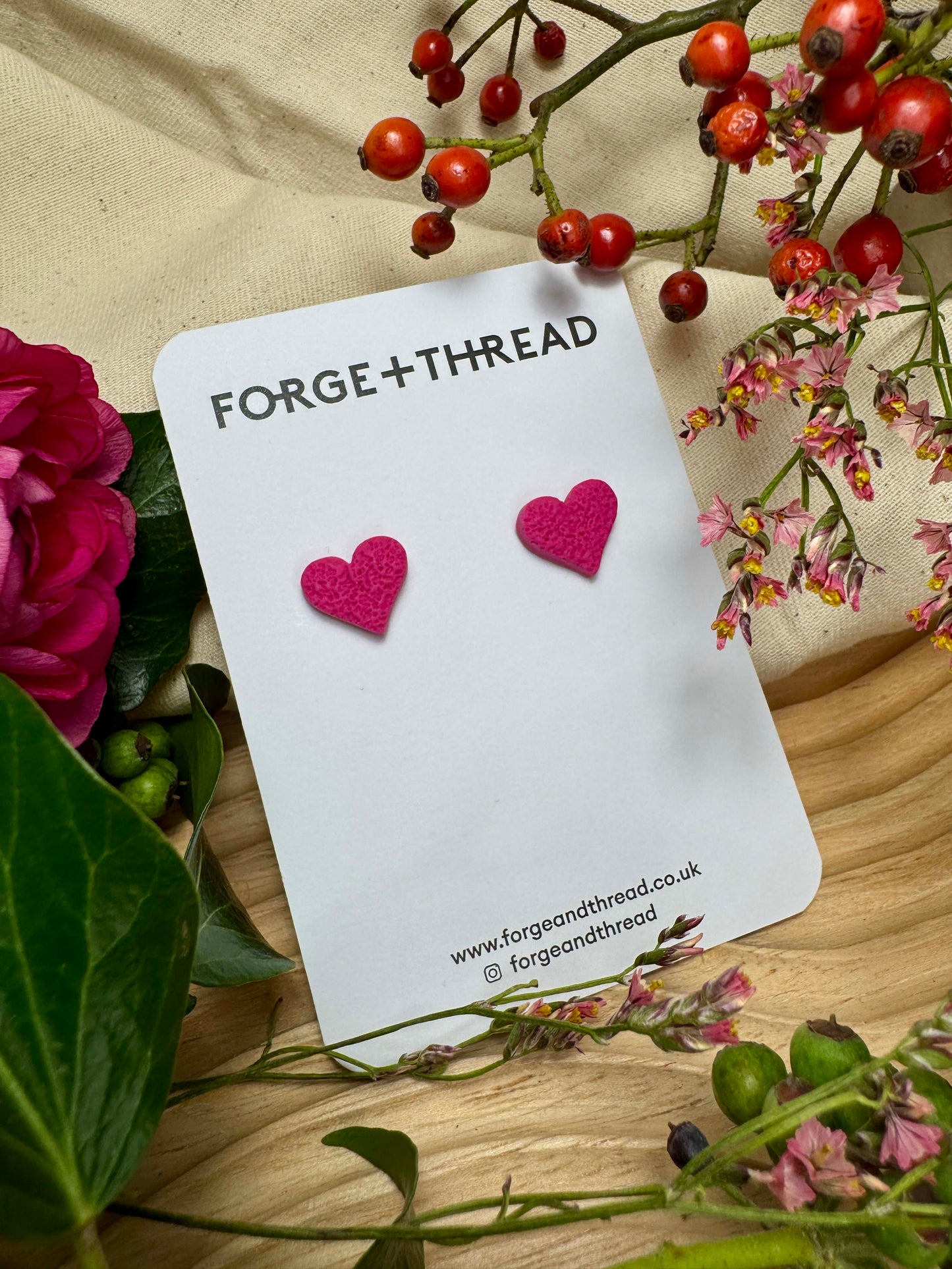 FUCHSIA PINK TEXTURED HEART STUDS
