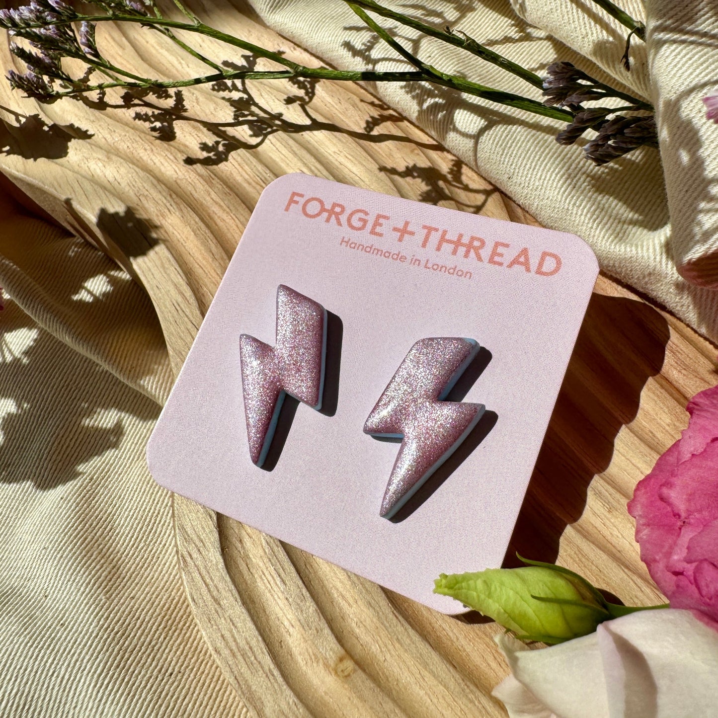 PINK METALLIC LIGHTNING STUDS