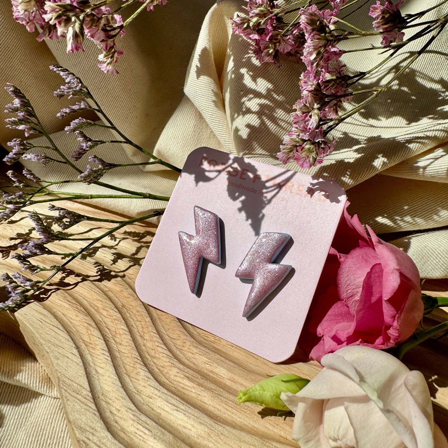 PINK METALLIC LIGHTNING STUDS