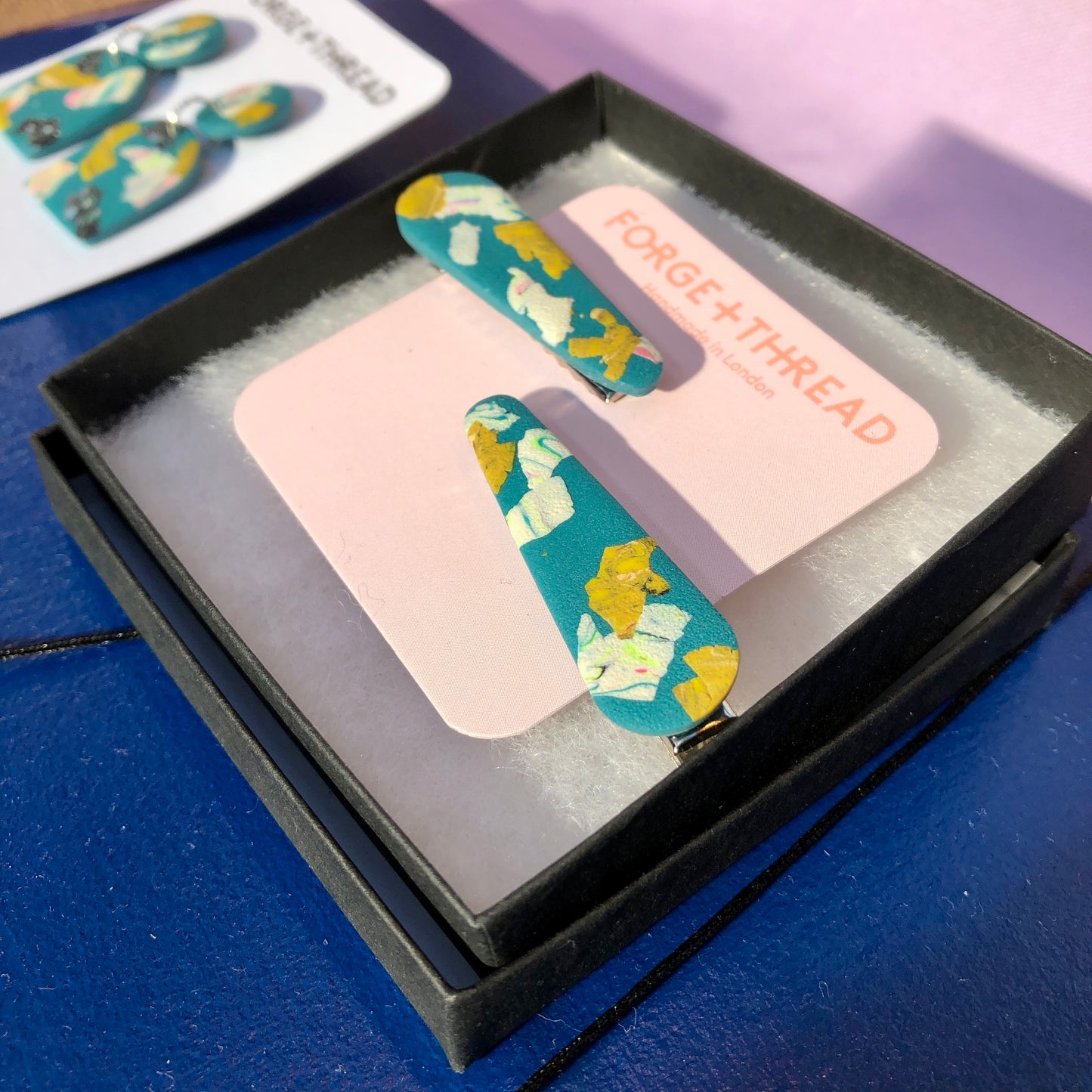 GREEN TERRAZZO HAIR SLIDES