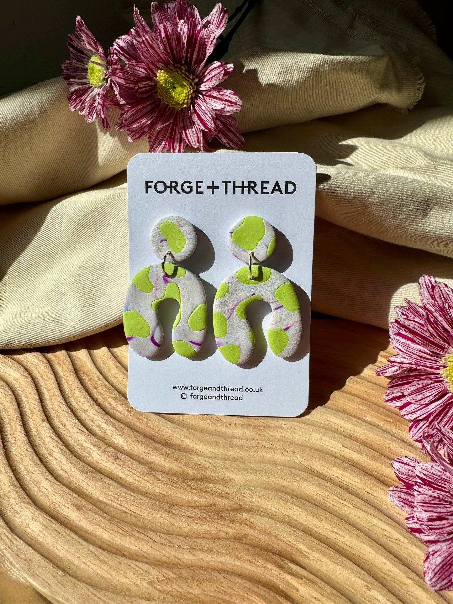 GREEN COW PATTERN WONKY ARCH EARRINGS