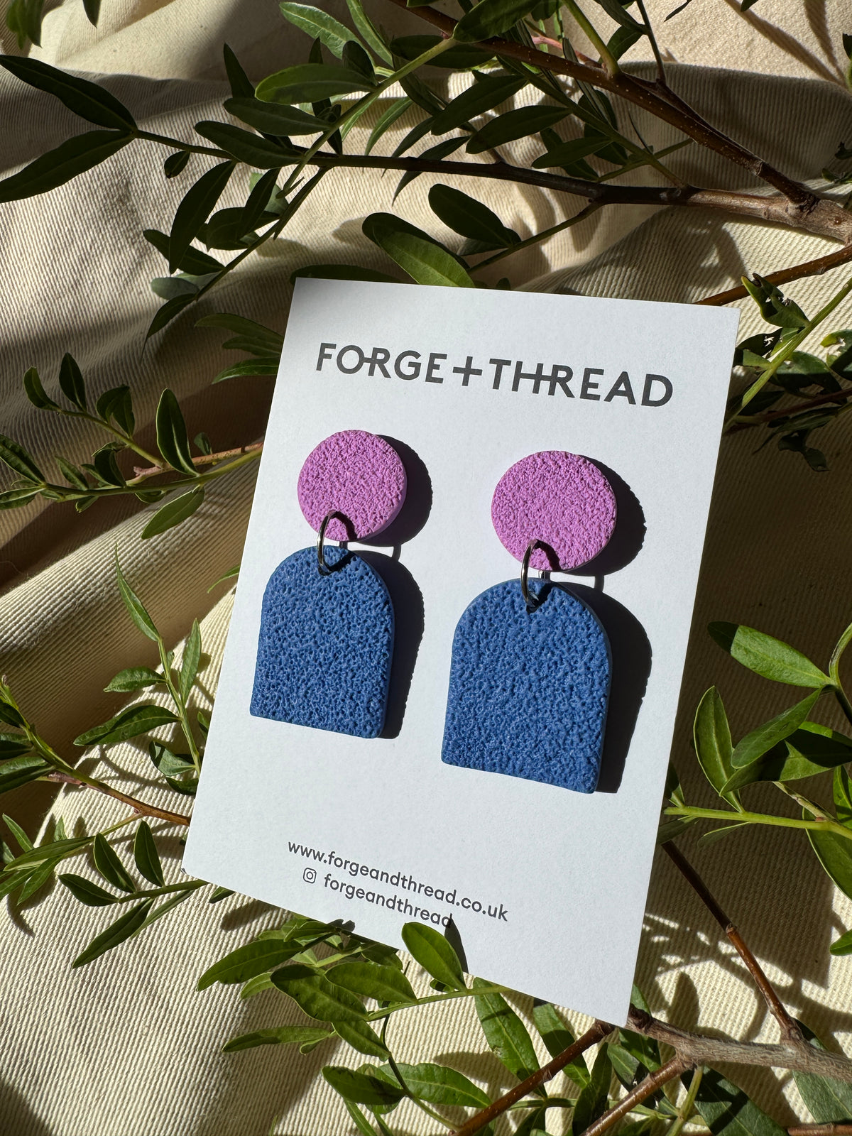 BLUE TEXTURED SMALL ARCH EARRINGS