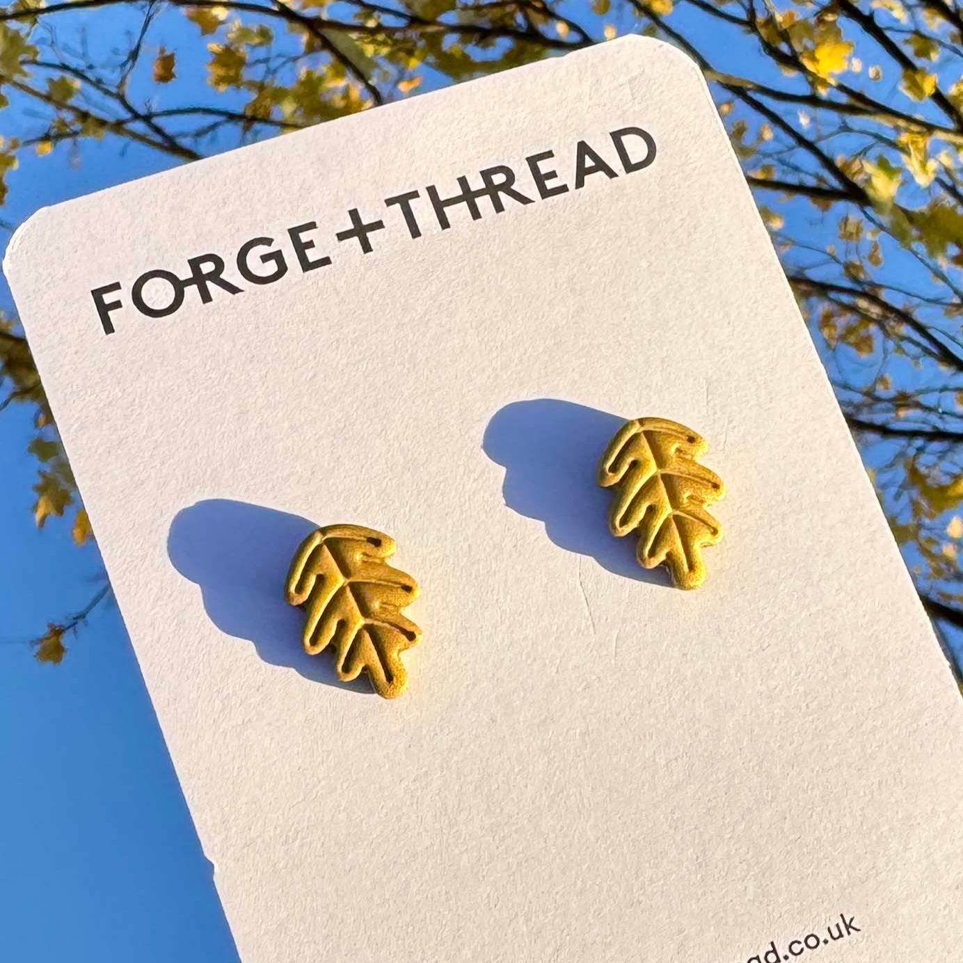 GOLD OAK LEAF STUDS