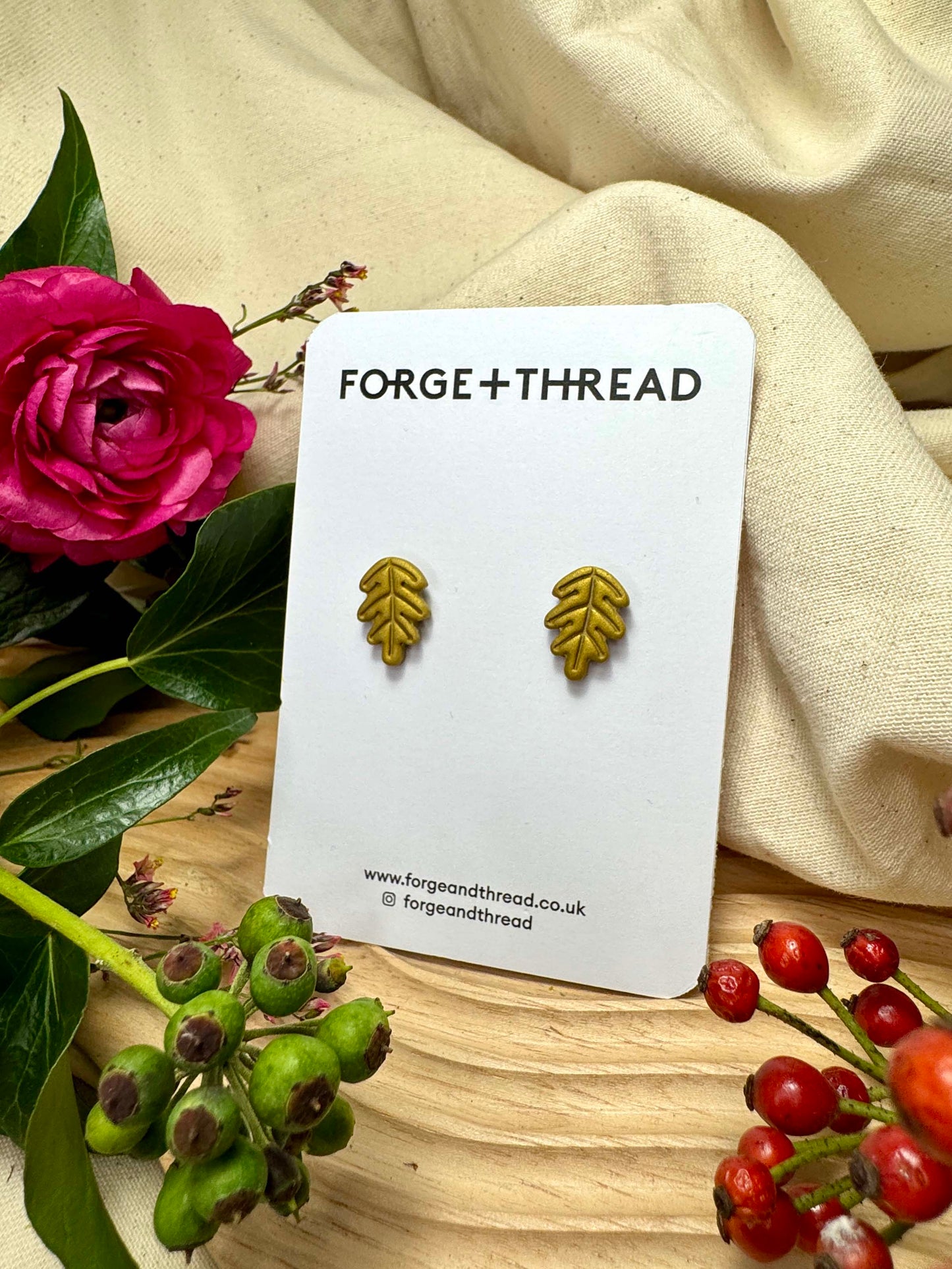 GOLD OAK LEAF STUDS