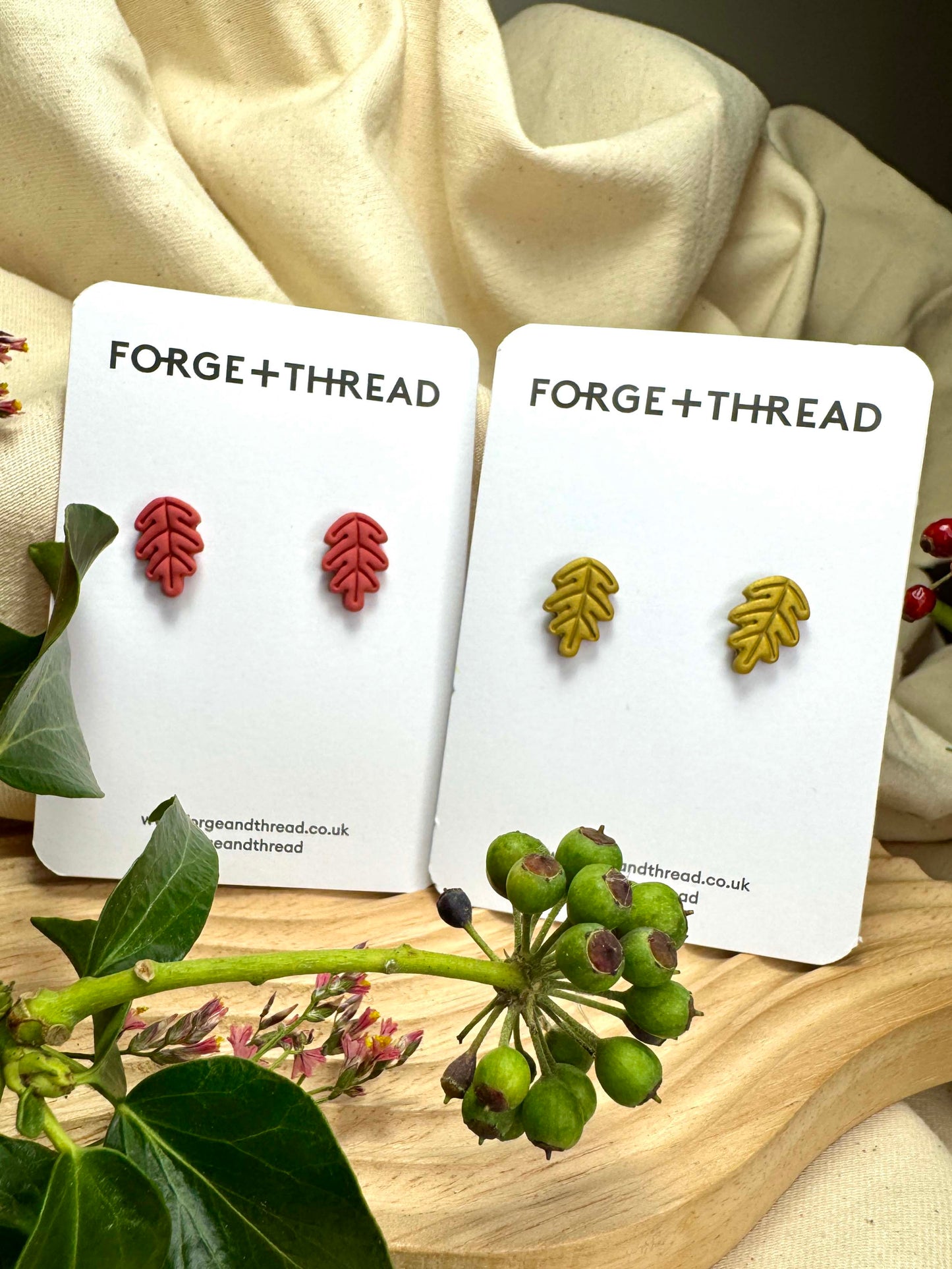 GOLD OAK LEAF STUDS