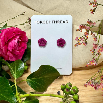 PURPLE FLOWER STUDS