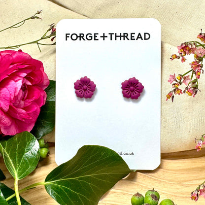 PURPLE FLOWER STUDS