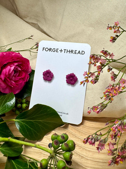 PURPLE FLOWER STUDS