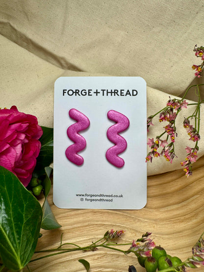 METALLIC PINK WIGGLE EARRINGS