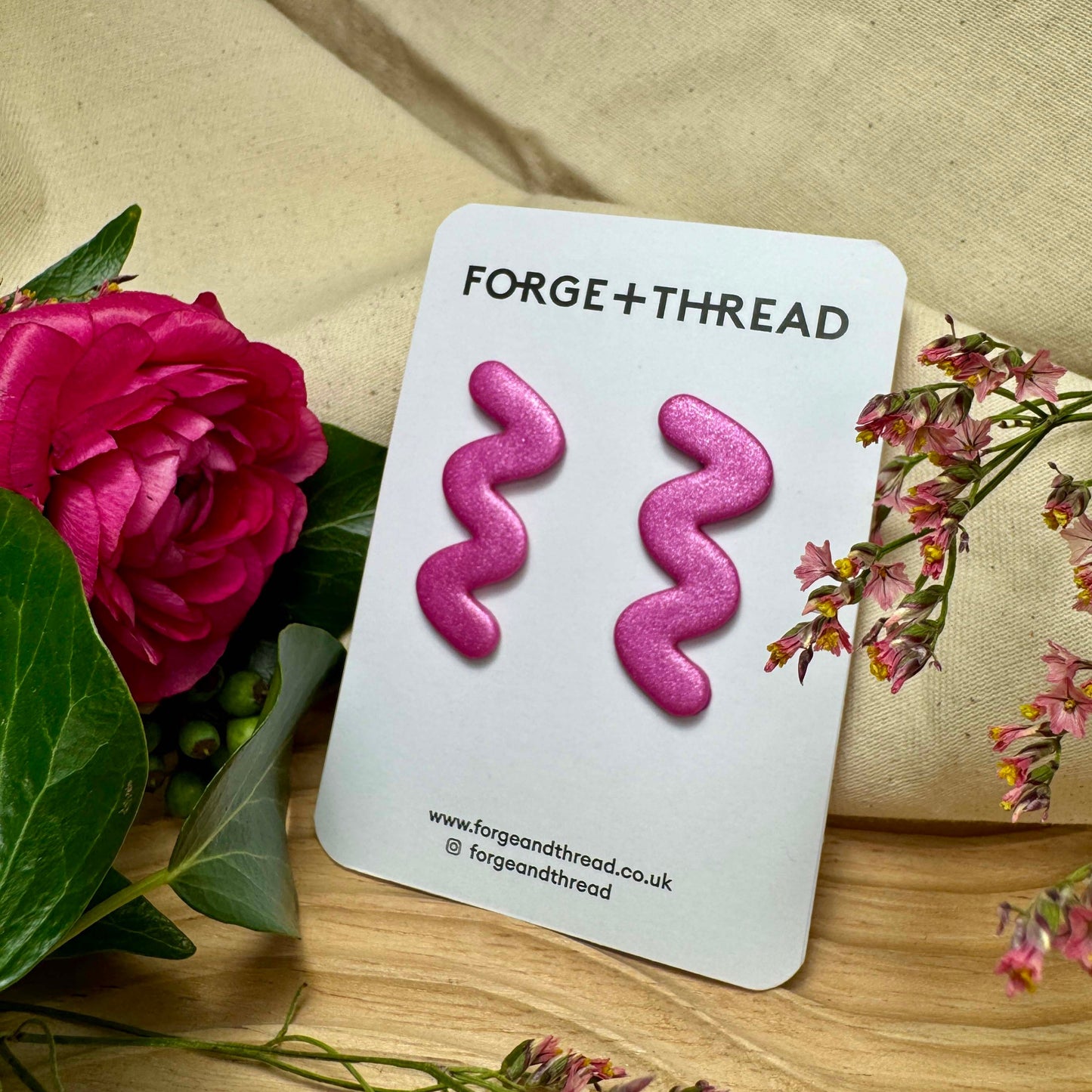 METALLIC PINK WIGGLE EARRINGS