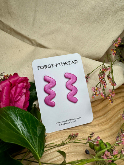 METALLIC PINK WIGGLE EARRINGS