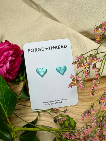 TURQUOISE METALLIC GLITTER HEART STUDS