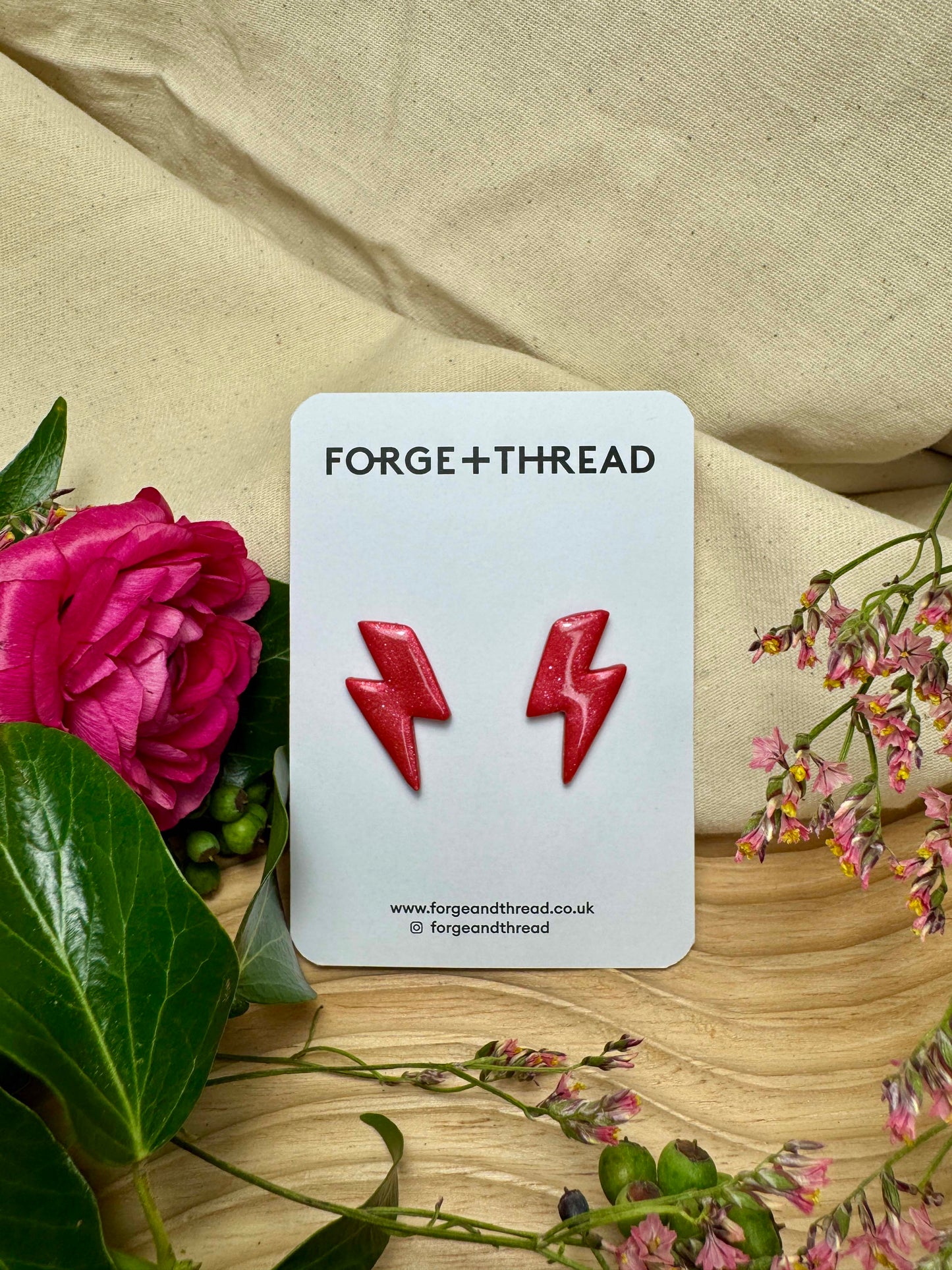 RED METALLIC LIGHTNING STUDS