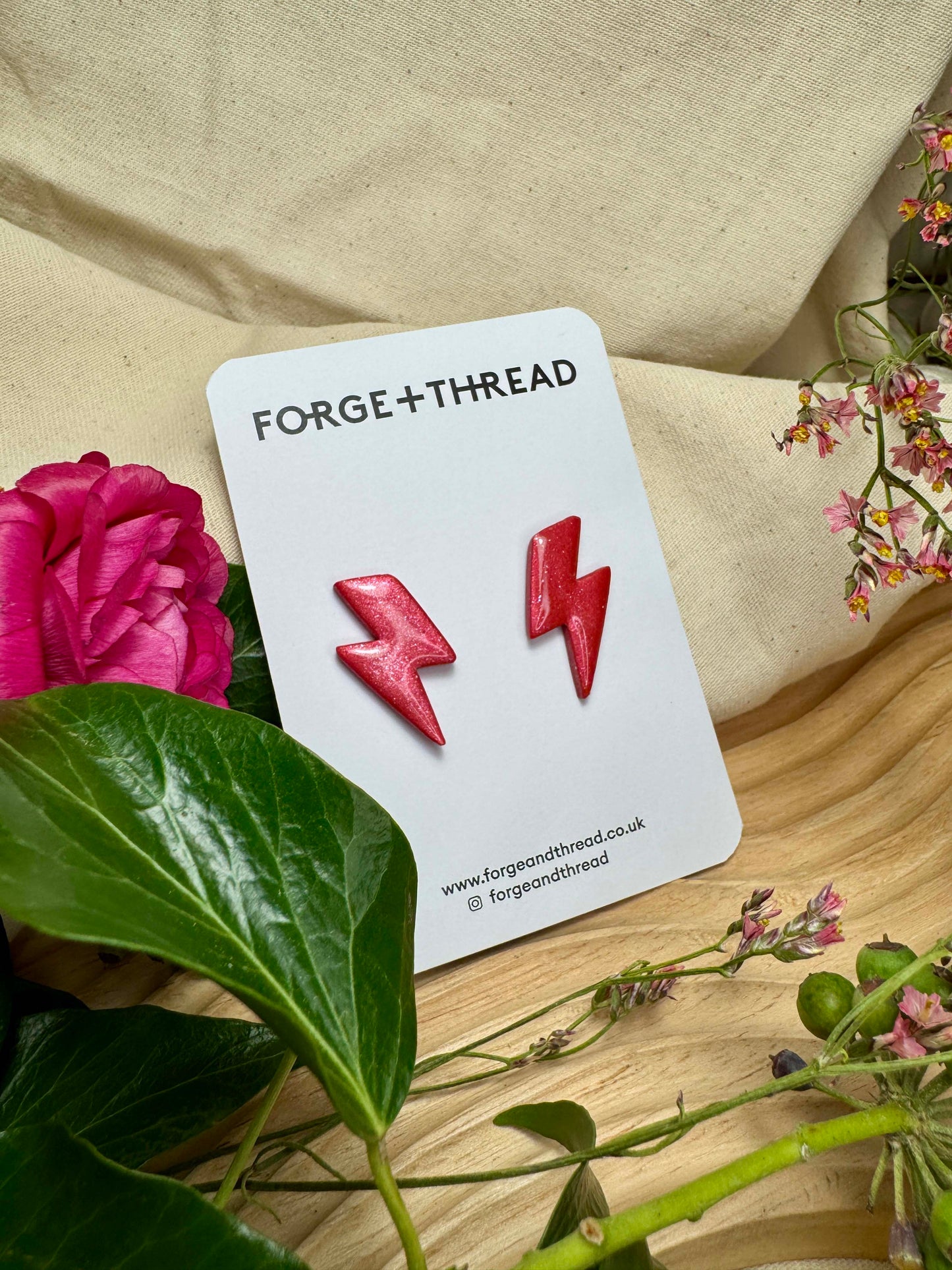 RED METALLIC LIGHTNING STUDS