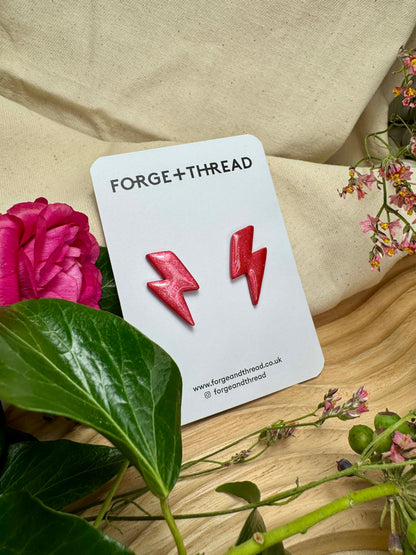 RED METALLIC LIGHTNING STUDS