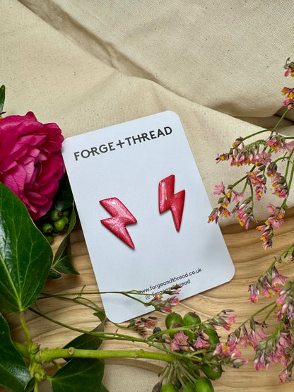 RED METALLIC LIGHTNING STUDS