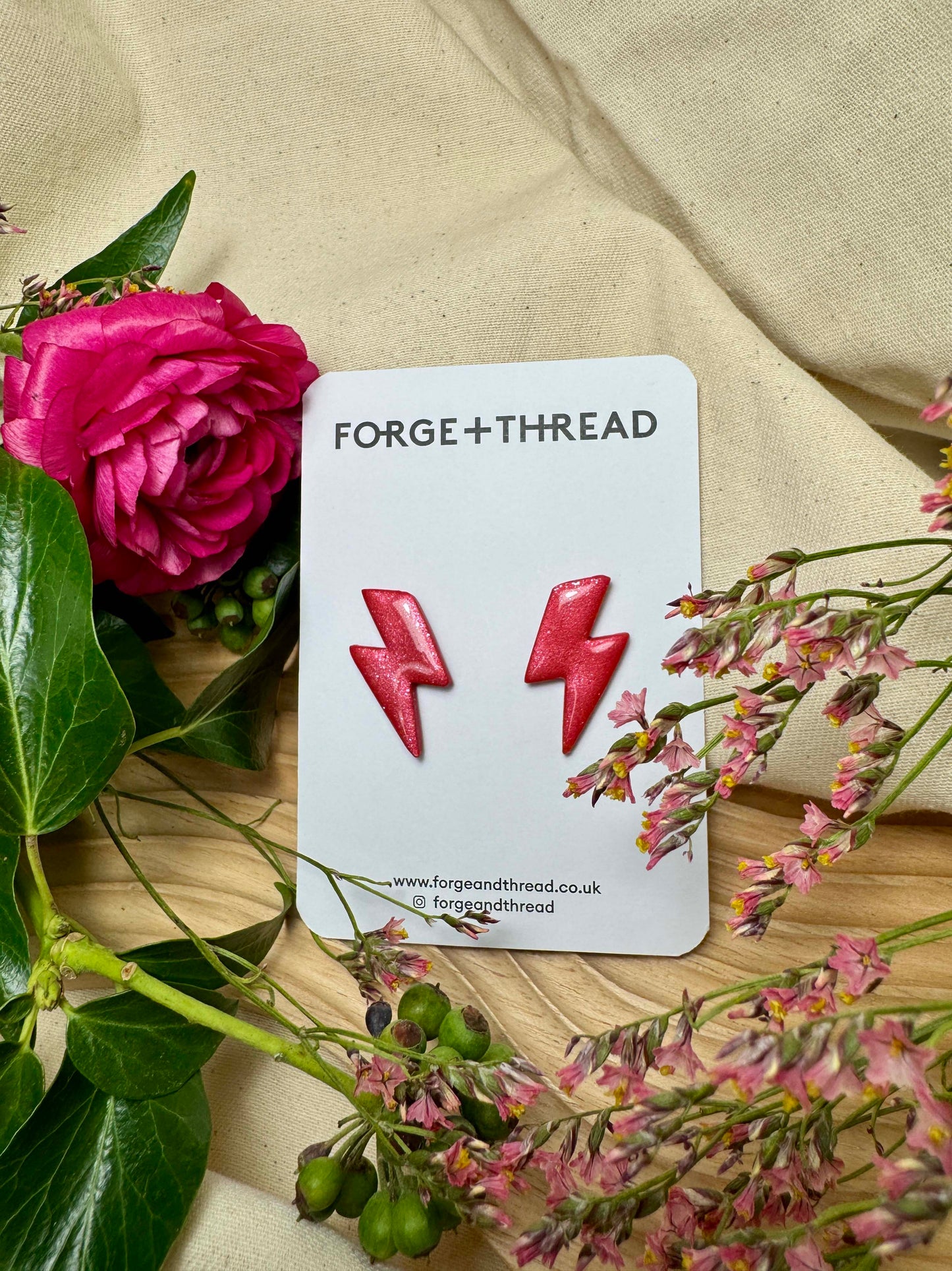 RED METALLIC LIGHTNING STUDS