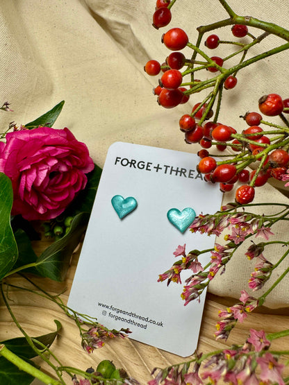 TURQUOISE METALLIC GLITTER HEART STUDS