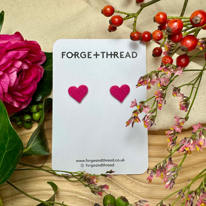 FUCHSIA PINK TEXTURED HEART STUDS