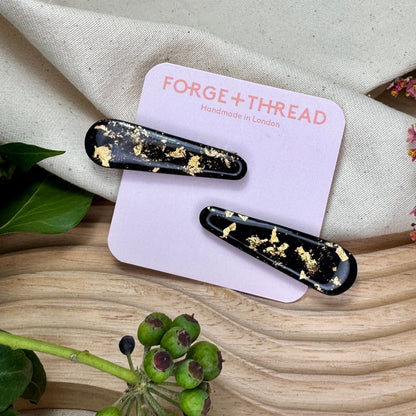 BLACK & GOLD HAIR SLIDES