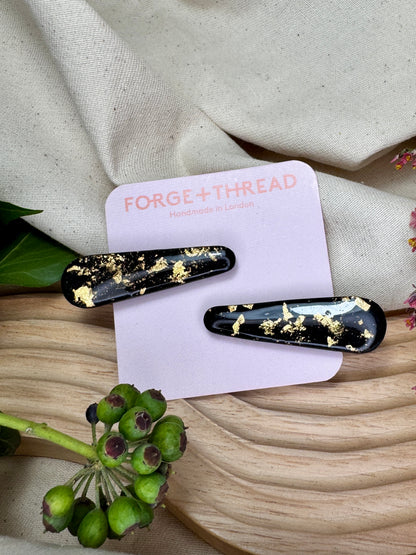 BLACK & GOLD HAIR SLIDES