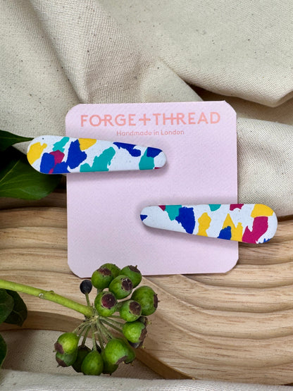 WHITE TERRAZZO HAIR SLIDES