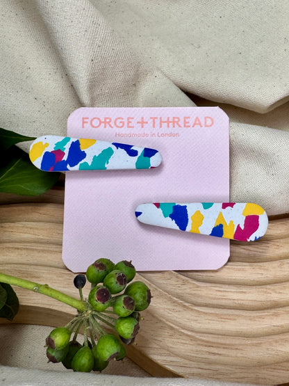 WHITE TERRAZZO HAIR SLIDES