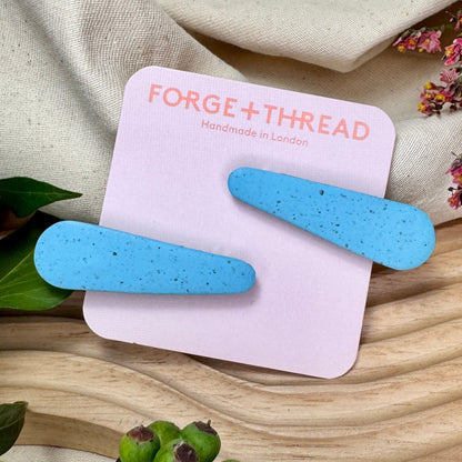 BLUE SPECKLE HAIR SLIDES