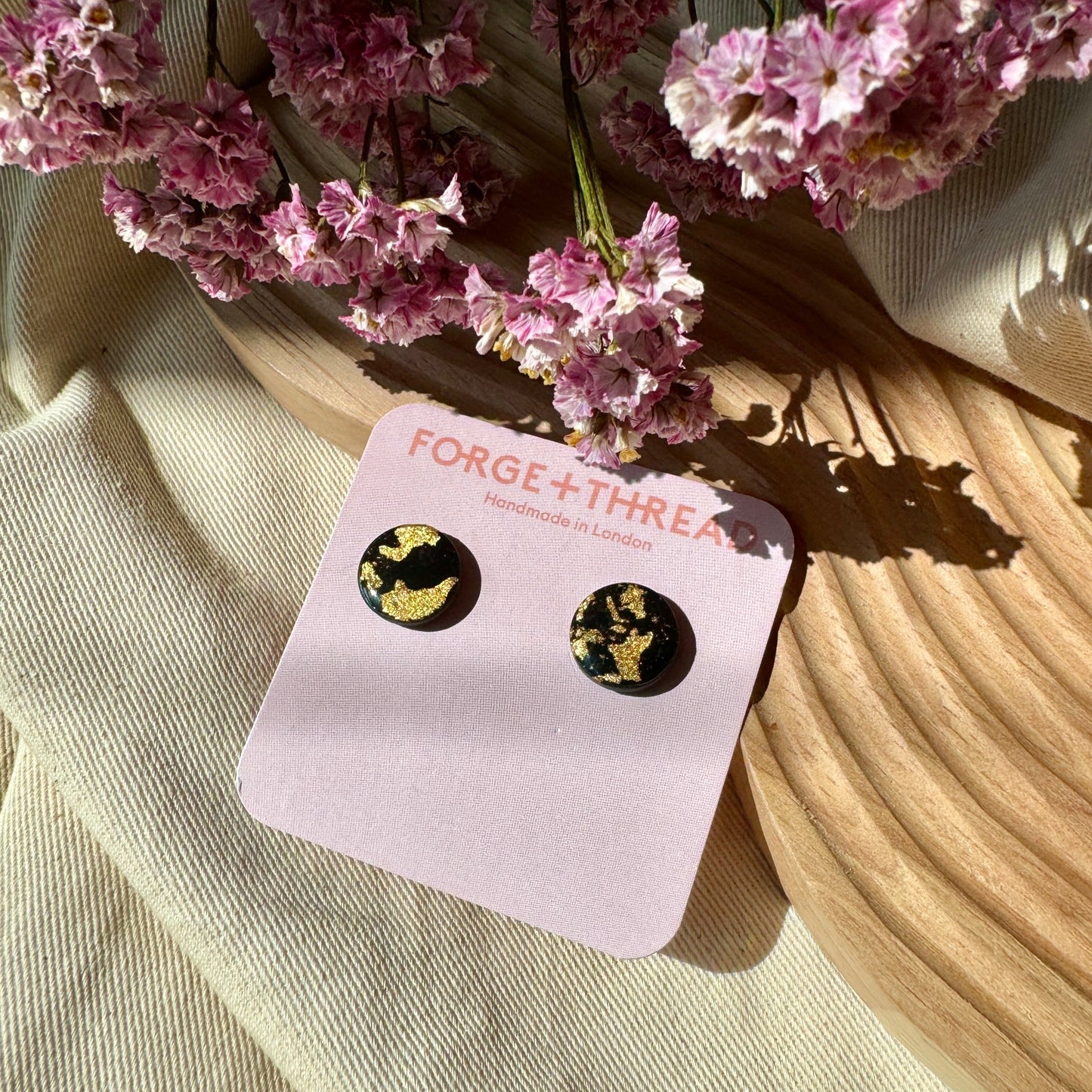 BLACK & GOLD STUDS