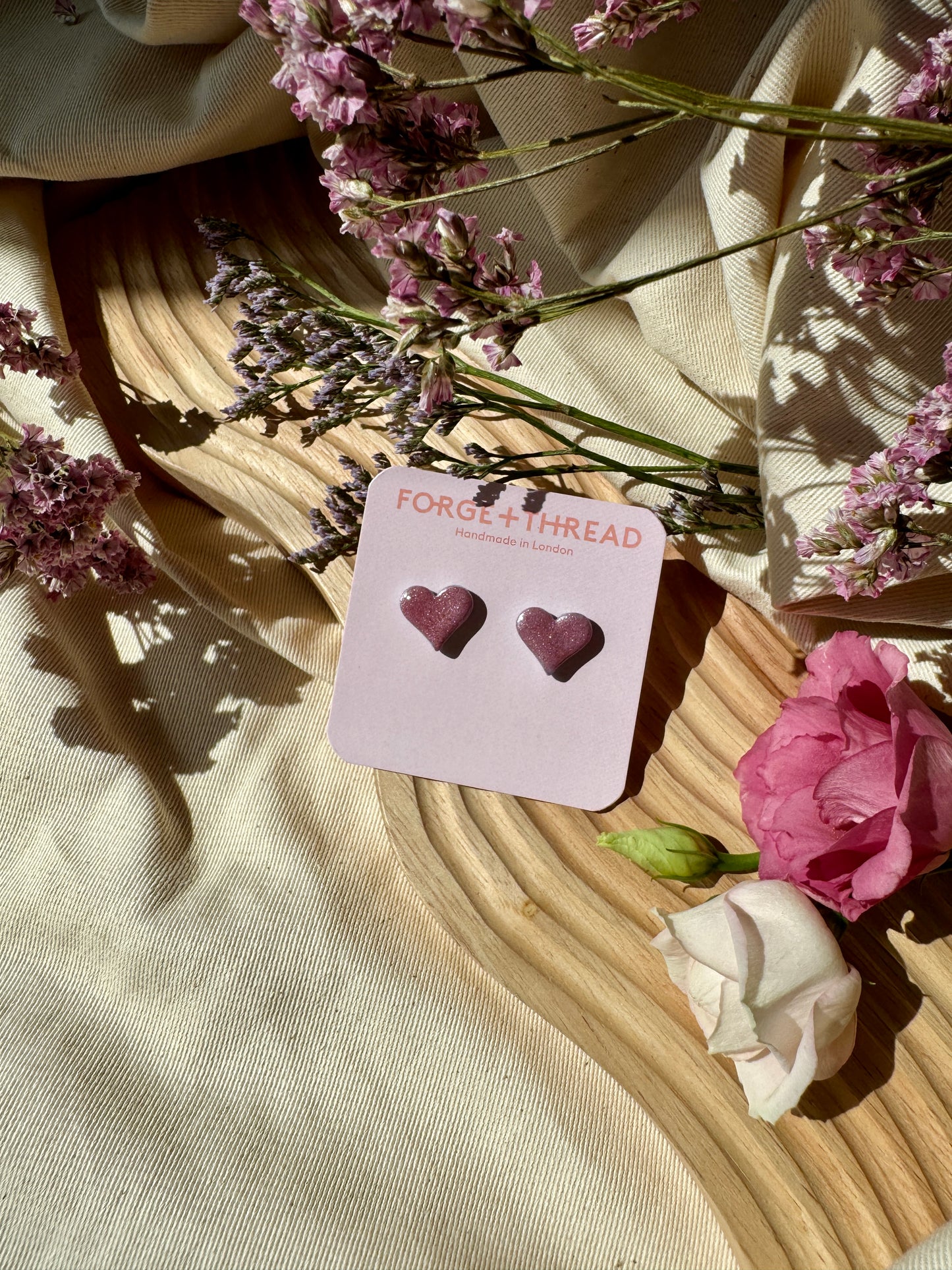METALLIC PINK HEART STUDS