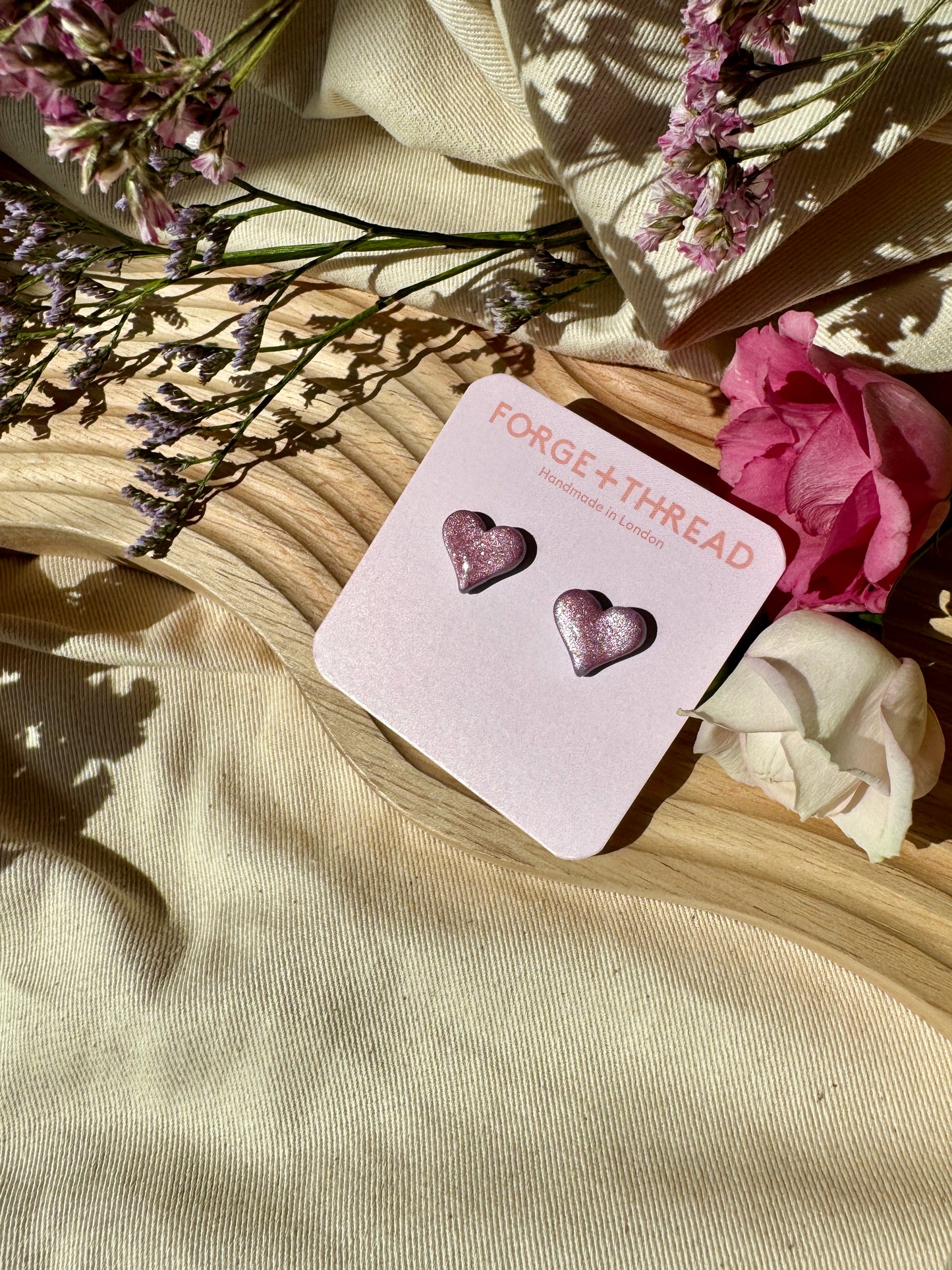 METALLIC PINK HEART STUDS
