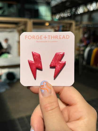 RED METALLIC LIGHTNING STUDS