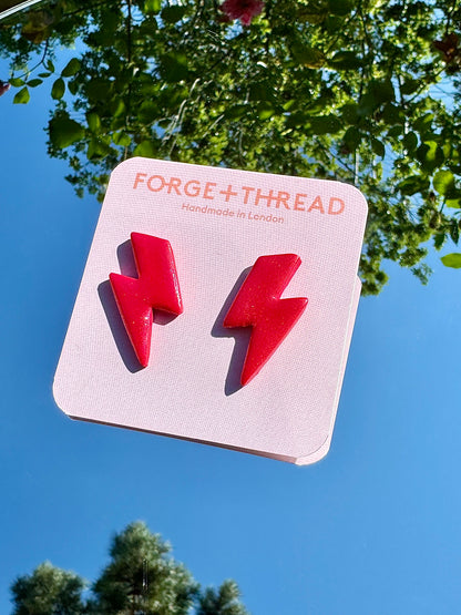 RED METALLIC LIGHTNING STUDS