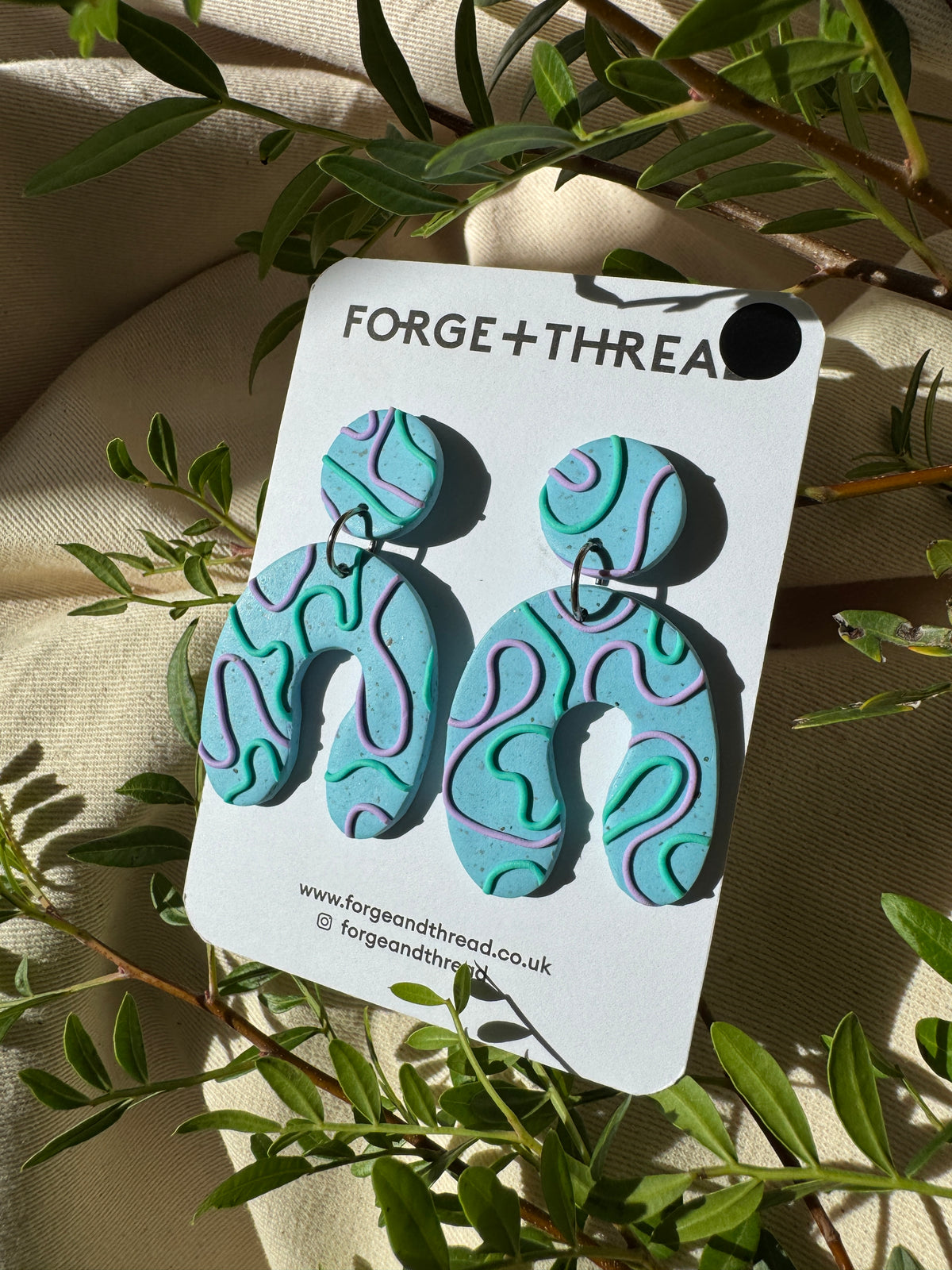 TURQUOISE WIGGLE WONKY ARCH EARRINGS