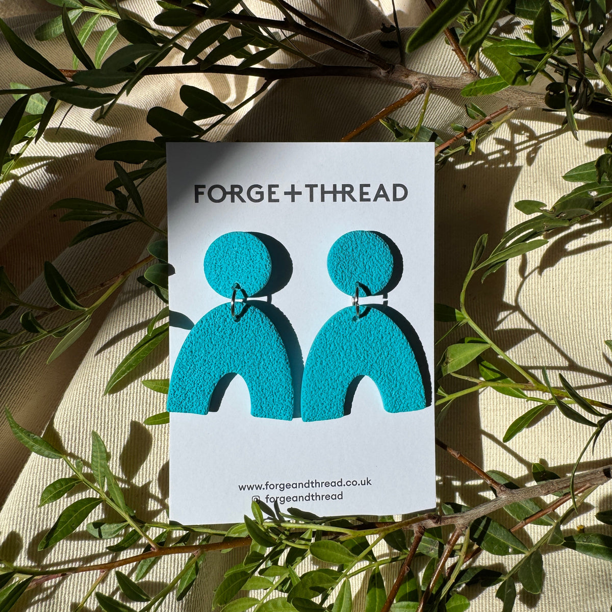 TURQUOISE TEXTURED ARC EARRINGS