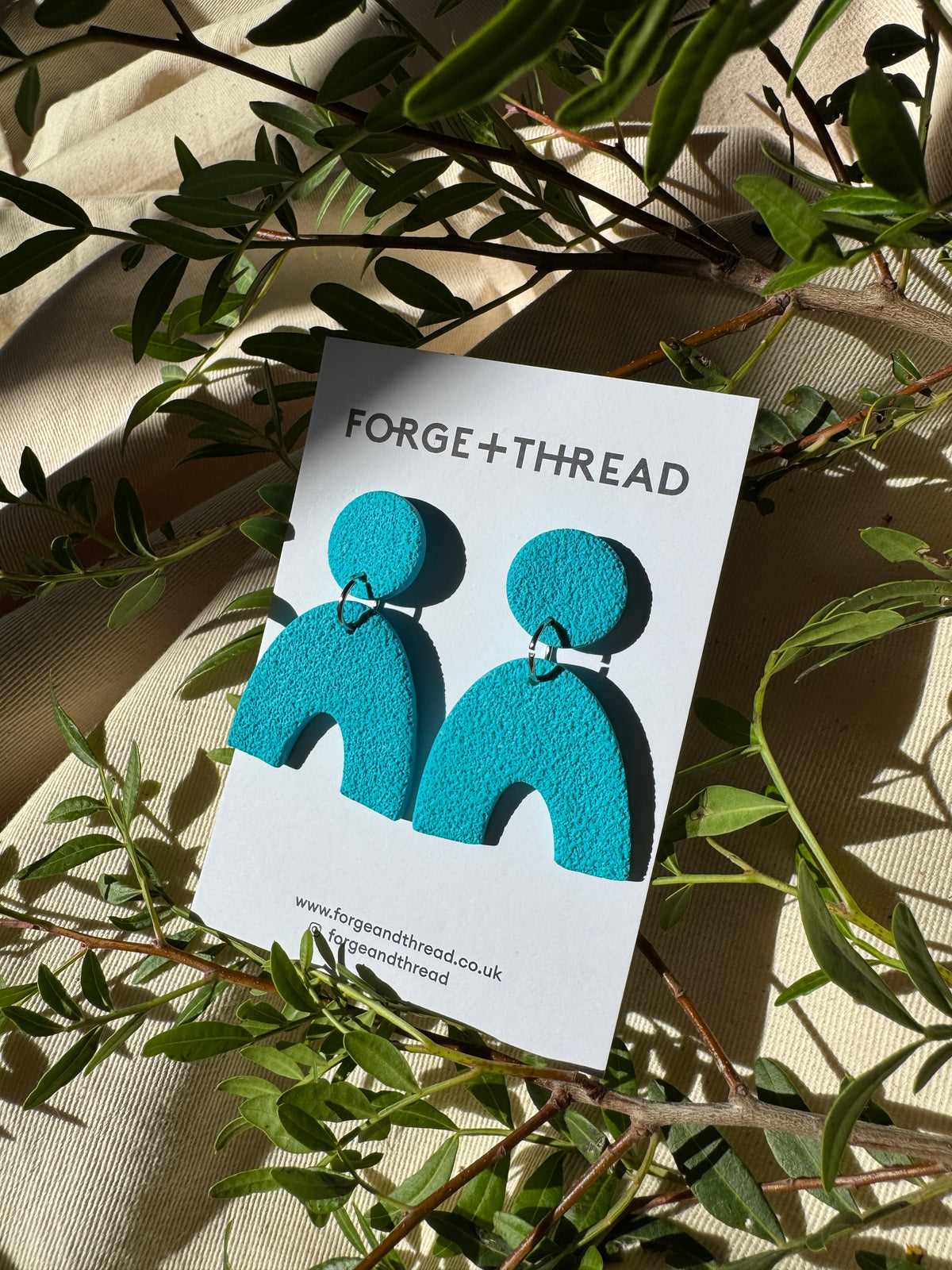 TURQUOISE TEXTURED ARC EARRINGS