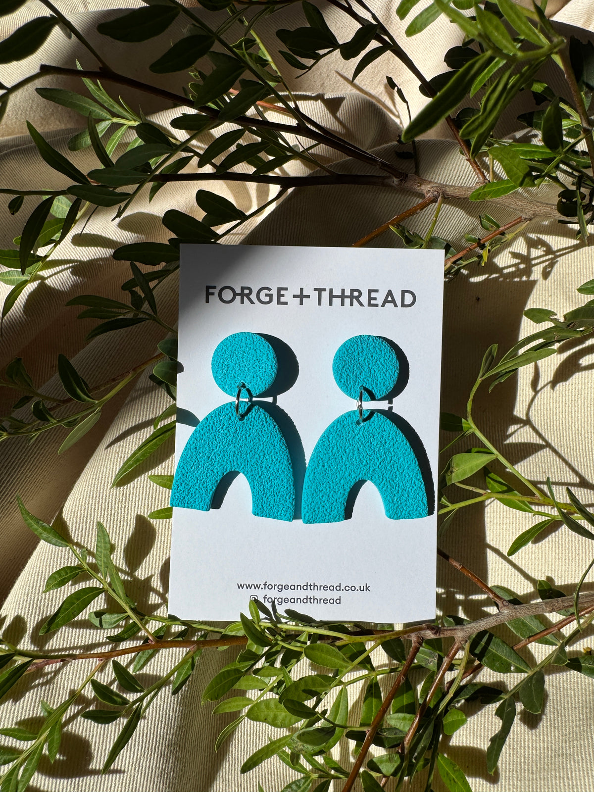 TURQUOISE TEXTURED ARC EARRINGS