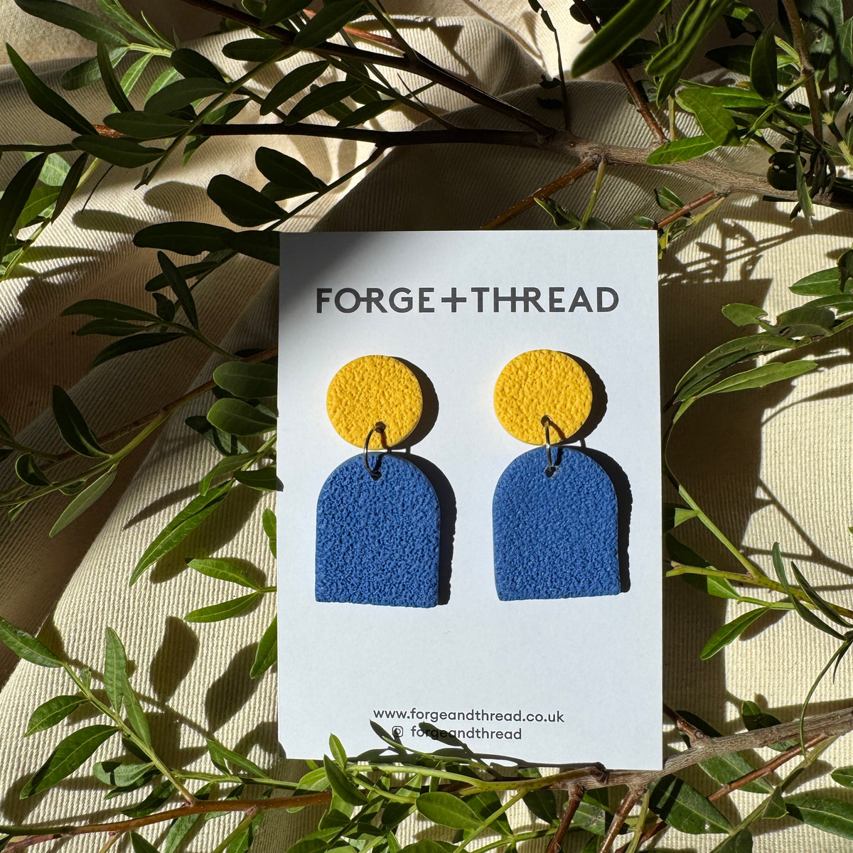 BLUE TEXTURED SMALL ARCH EARRINGS