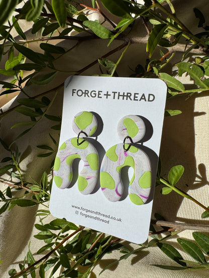GREEN COW PATTERN WONKY ARCH EARRINGS