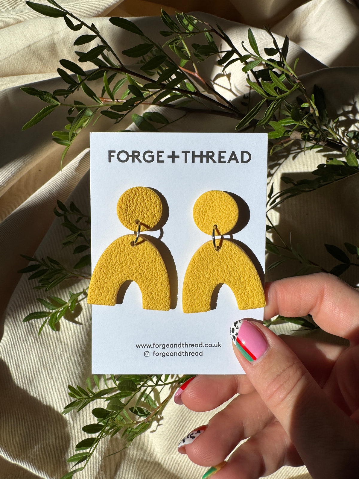 YELLOW TEXTURED ARC EARRINGS