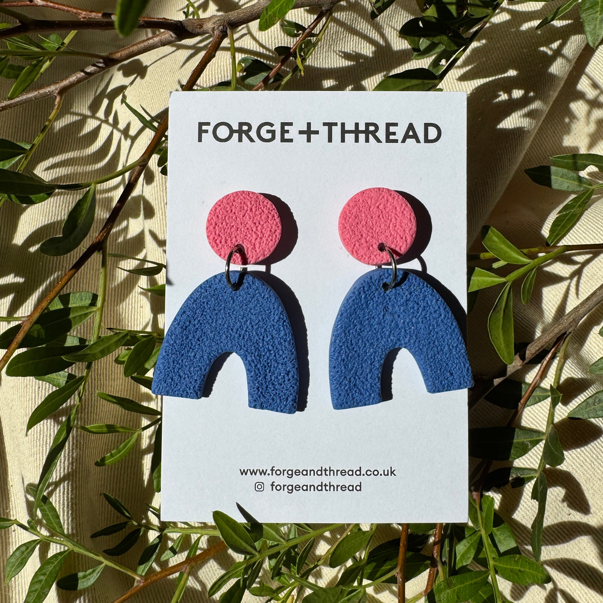 BLUE TEXTURED ARC EARRINGS