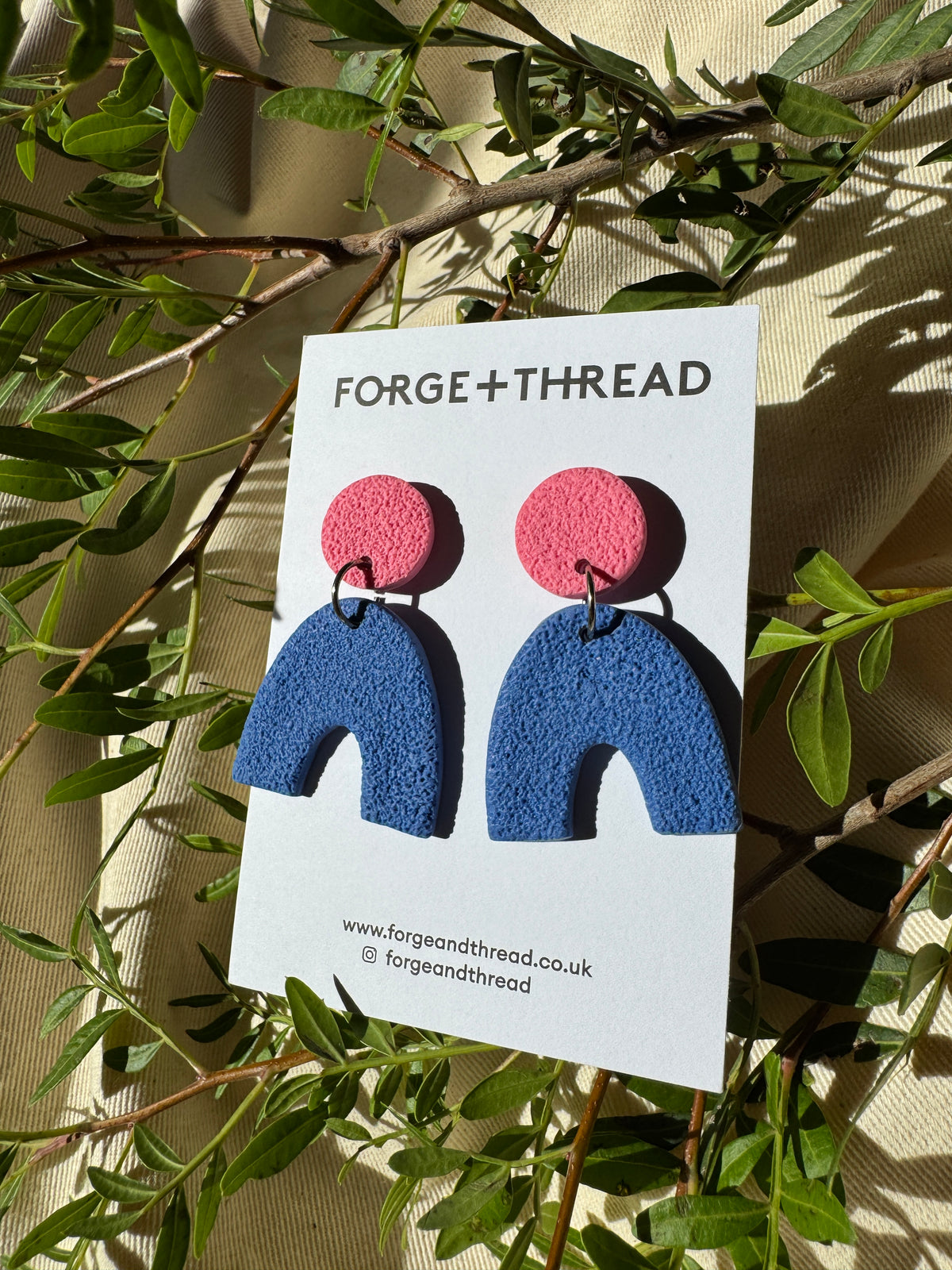 BLUE TEXTURED ARC EARRINGS
