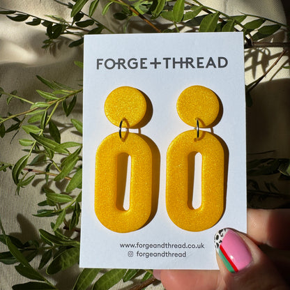 METALLIC YELLOW OVAL DROP EARRINGS