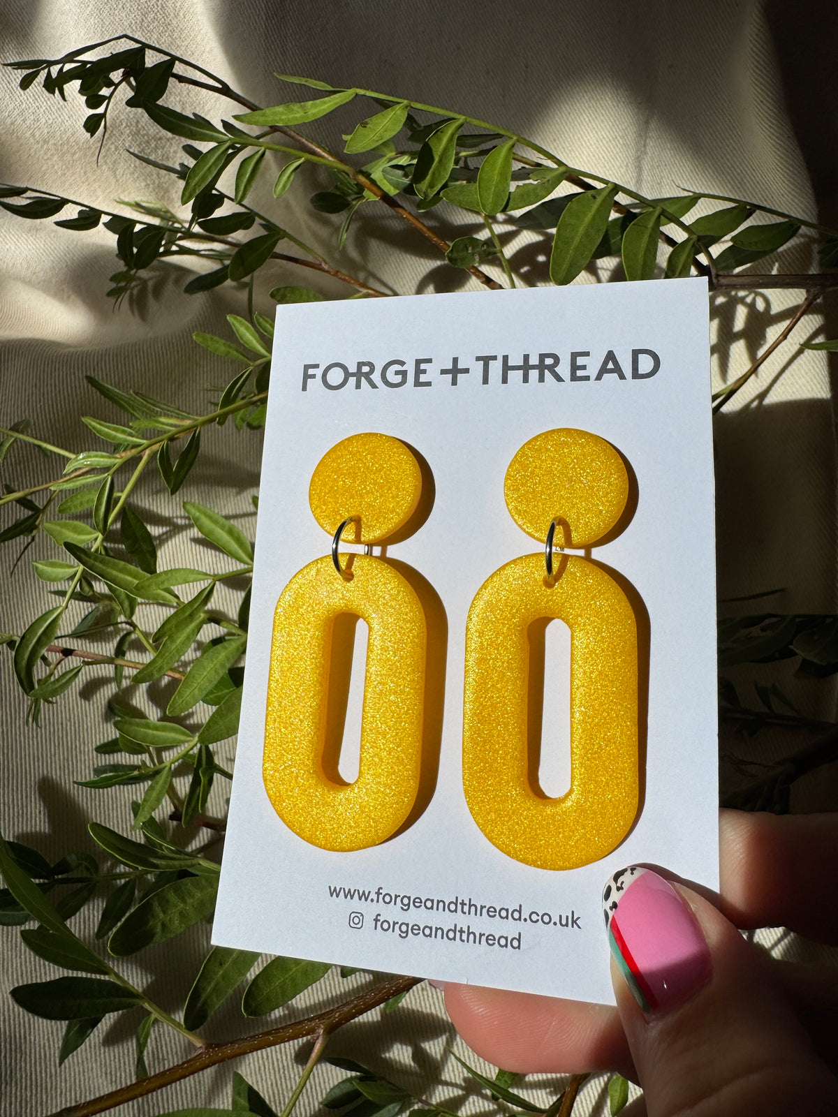 METALLIC YELLOW OVAL DROP EARRINGS