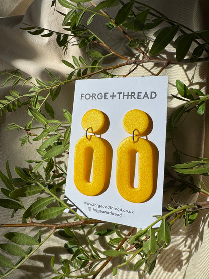 METALLIC YELLOW OVAL DROP EARRINGS