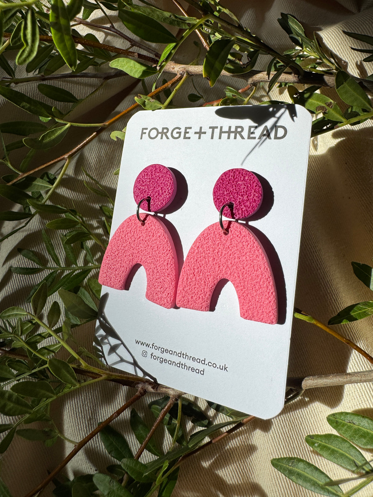 LIGHT PINK TEXTURED ARC EARRINGS